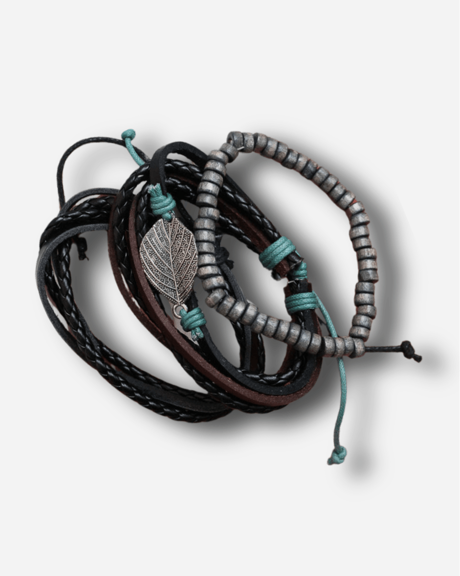 Set of leather and beaded bracelets on a light gray background