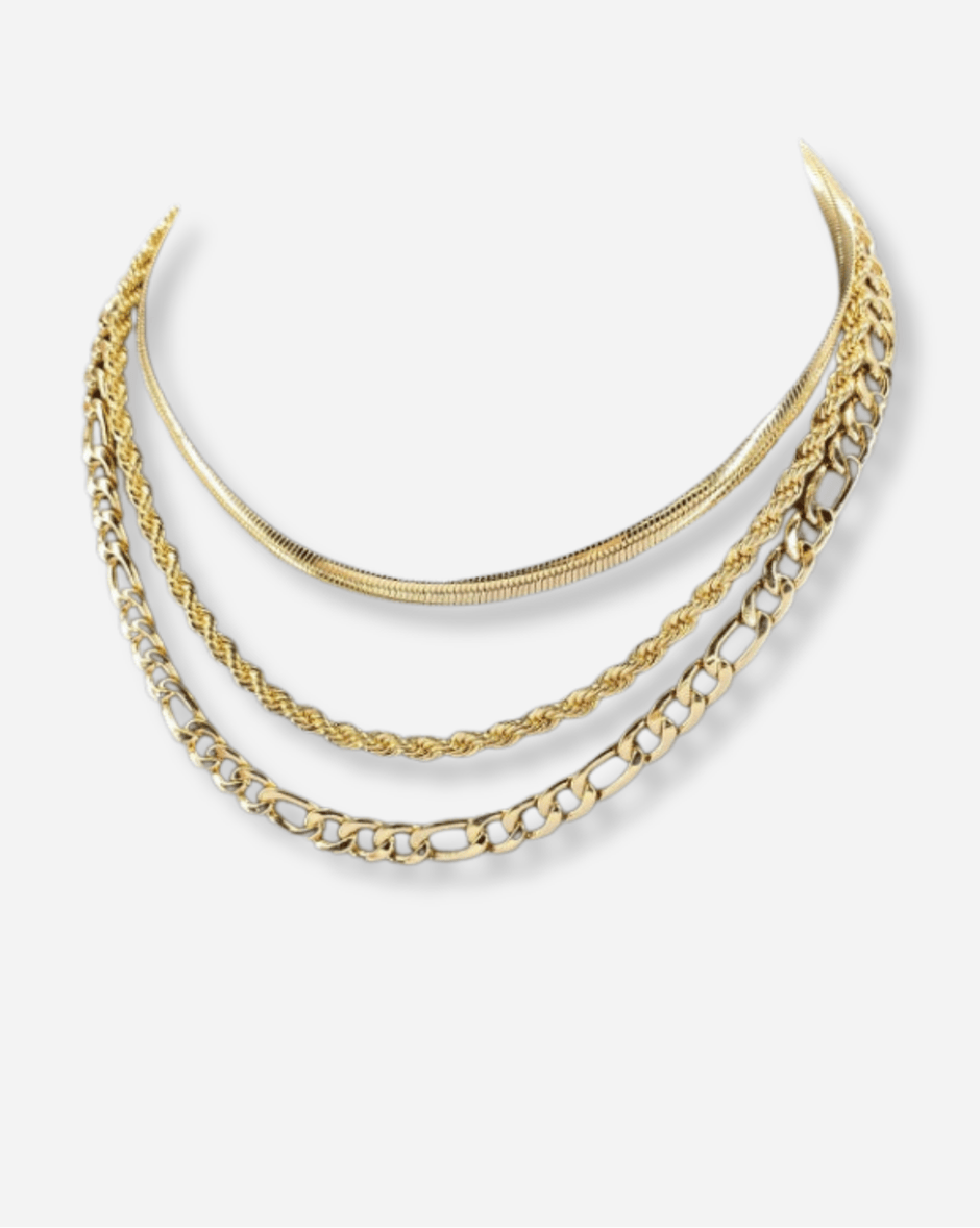 Three gold necklaces of different styles on a white background