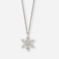 Silver snowflake pendant necklace on a white background