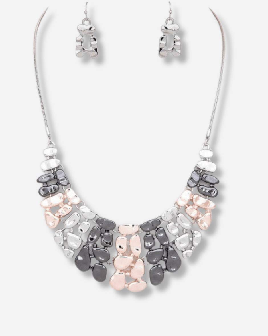 Necklace with pink and gray stones on a white background