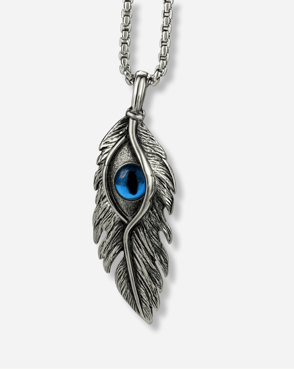Silver feather-shaped pendant with a blue gemstone on a white background