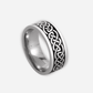 Silver ring with Celtic knot design on a white background