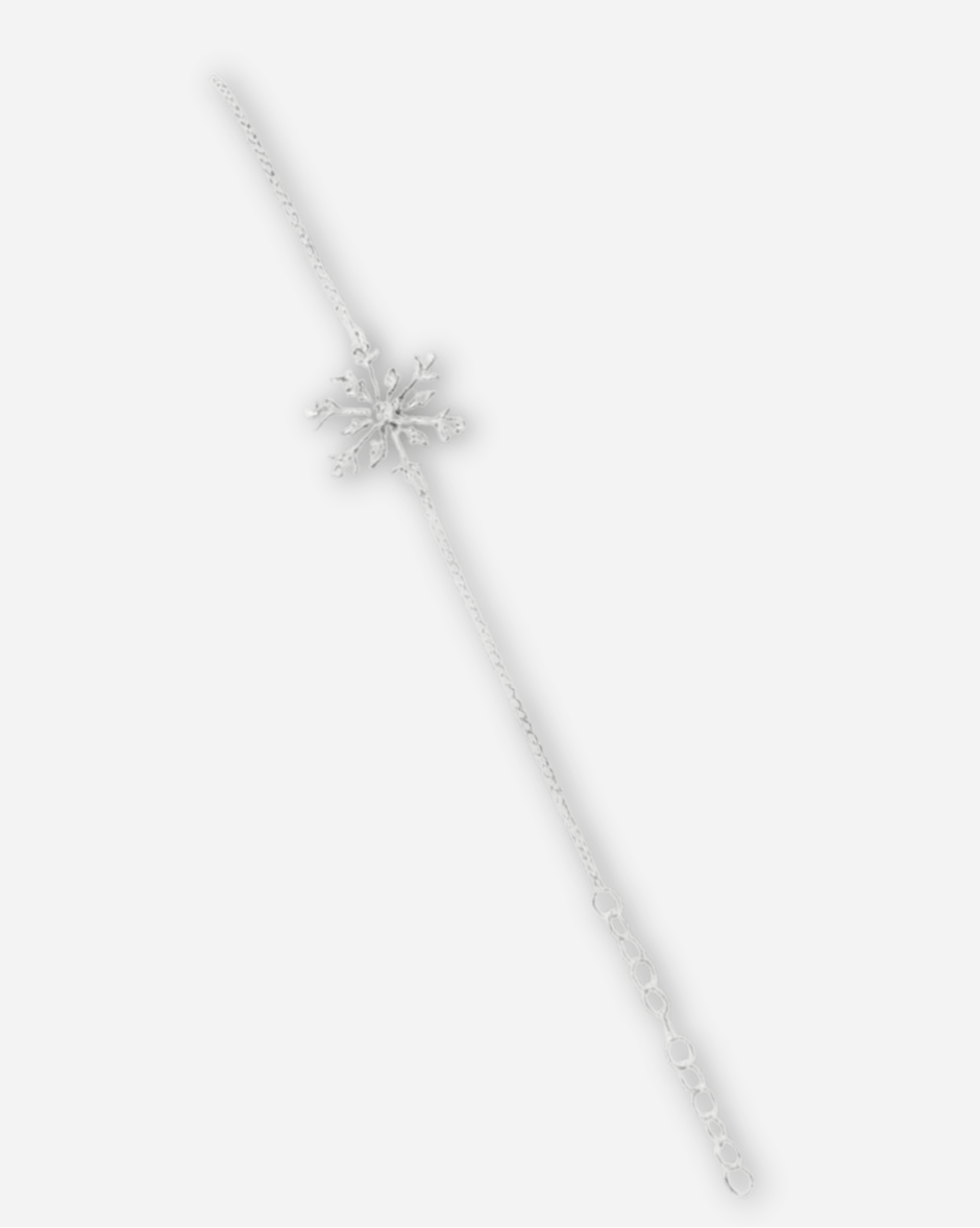 Silver necklace with a star-shaped pendant on a light gray background