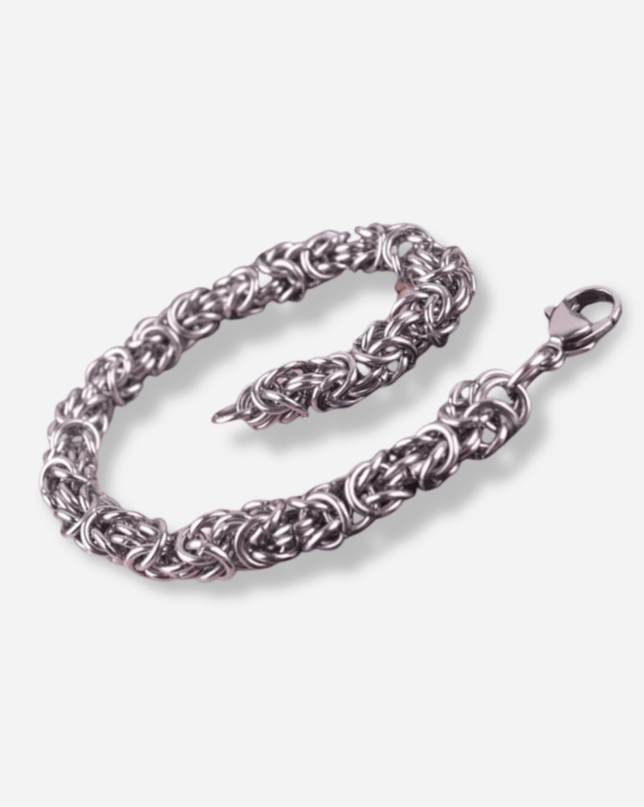 Silver chain bracelet on a white background