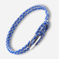 Blue braided bracelet with a silver clasp on a white background