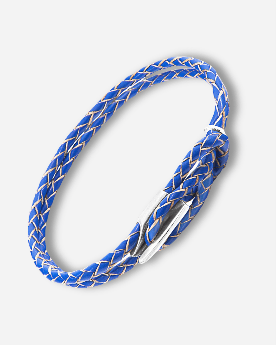 Blue braided bracelet with a silver clasp on a white background