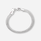 Silver braided bracelet on a white background