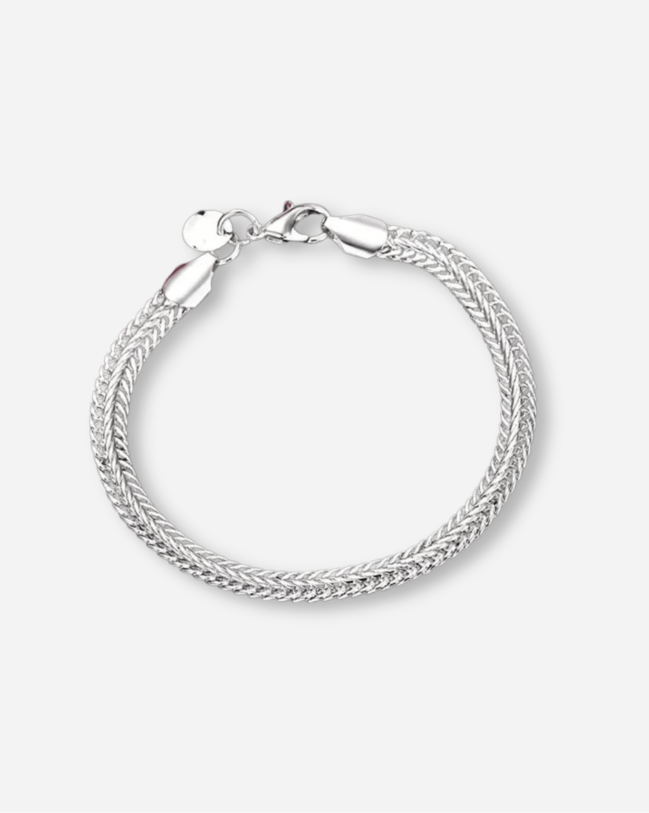 Silver braided bracelet on a white background