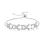 Silver bracelet with intricate design on a white background