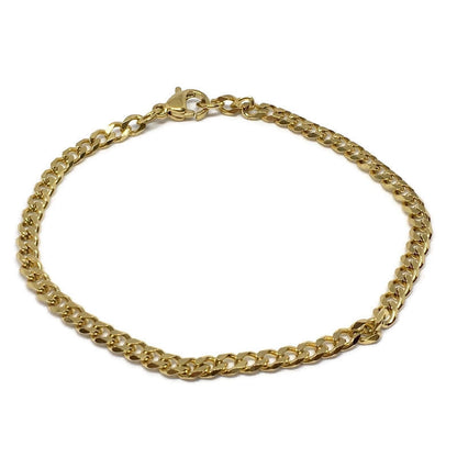 Gold chain bracelet on a white background