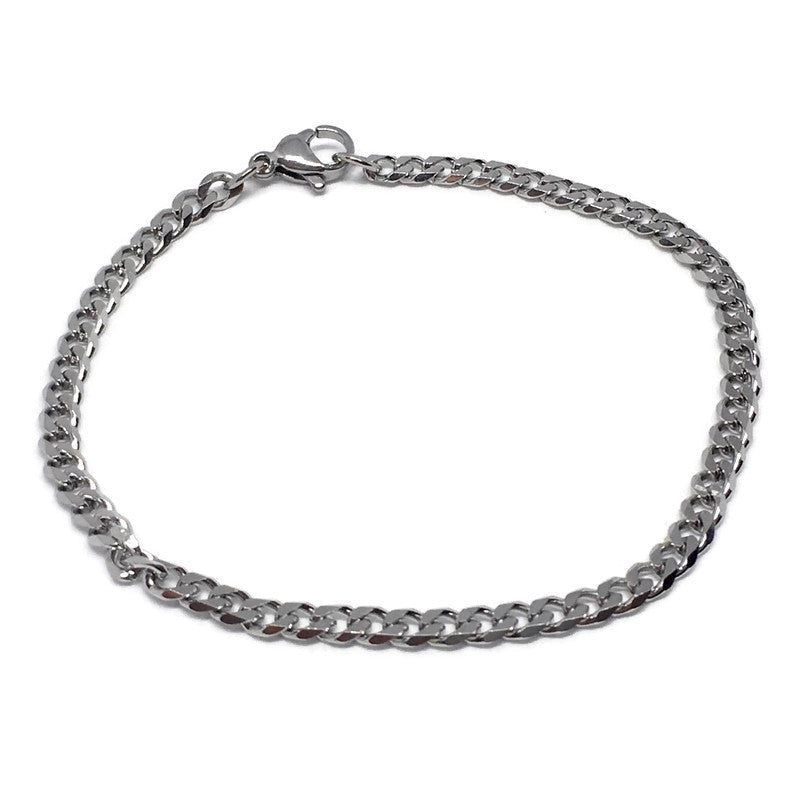 Silver chain bracelet on a white background