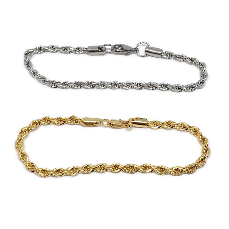 Gold and silver rope chain bracelets on a white background