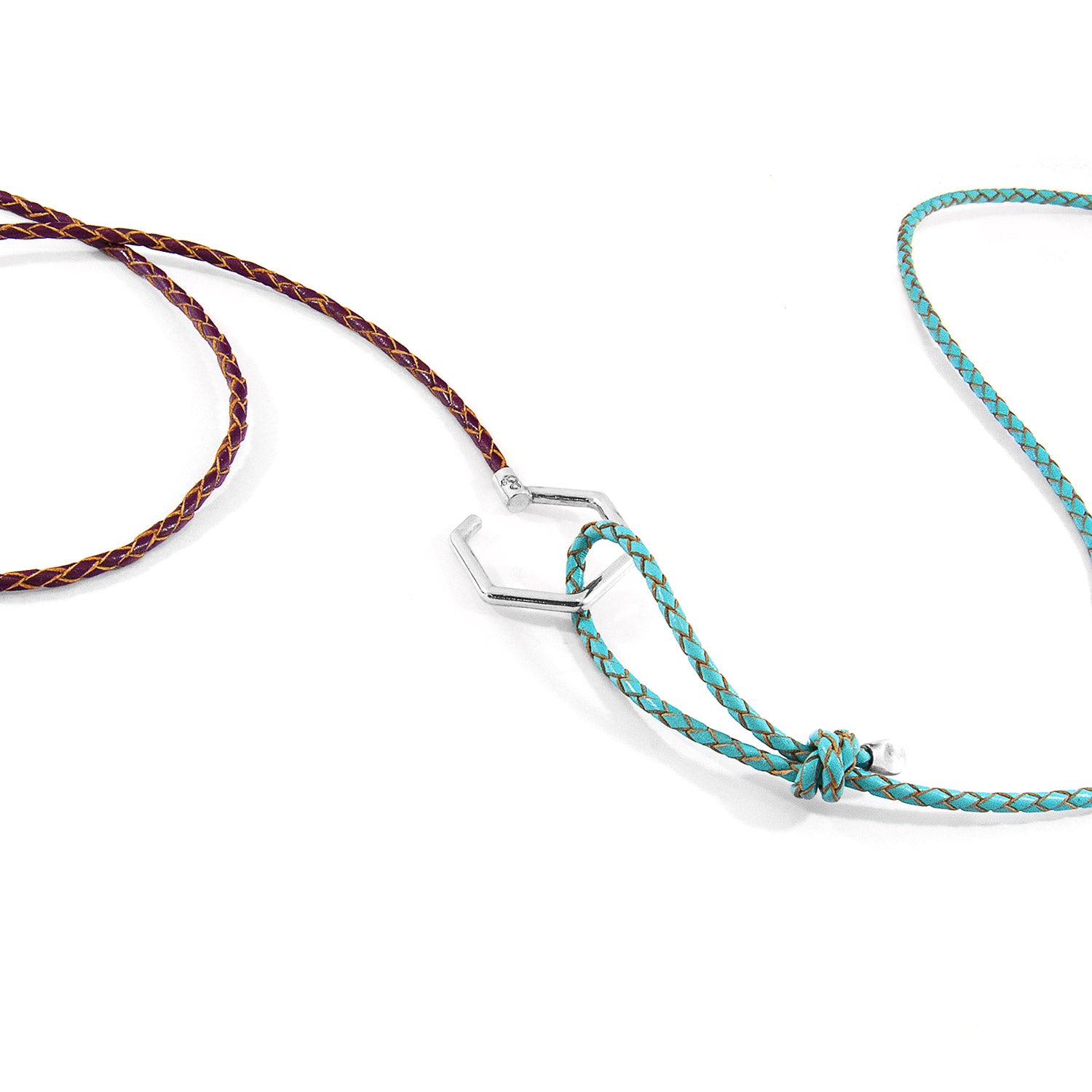 Two braided necklaces, one brown and one turquoise, on a white background.