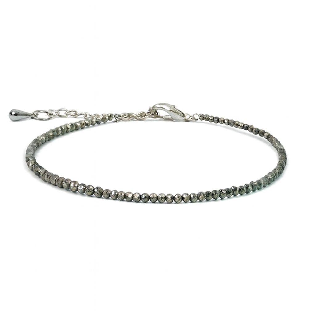 Silver bracelet with small beads on a white background